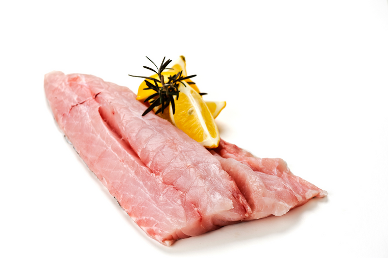 Grouper Fillet with lemon wedge and rosemary twig